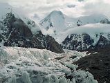 
The next morning we started our trek to Gasherbrum base camp in mostly cloudy weather. After 30 minutes we reached �Gasherbrum Corner� at the junction of the Upper Baltoro Glacier with the tributary Abruzzi Glacier. Gasherbrum I and Gasherbrum I South lie straight ahead. Gasherbrum I (8080m) is the 11th highest mountain in the world. Gasherbrum I was first climbed by July 5, 1958 by Americans Pete Schoening and Andy Kauffman.
